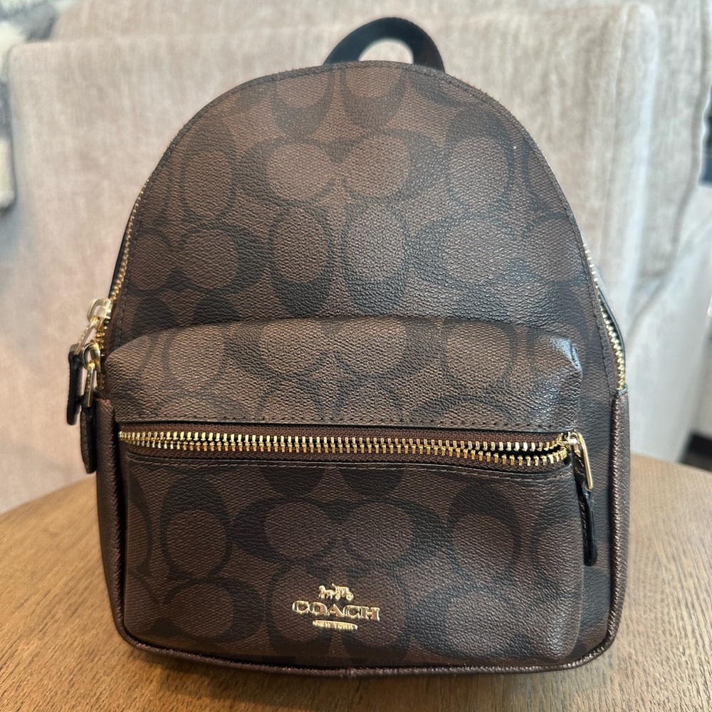 Coach Brown cheetah Mini Backpack